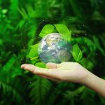 Save,Earth,Concept.,Hands,With,Earth,And,Recycle,Logo,Over